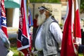 Participant Holding Rebel Flag During Ceremony