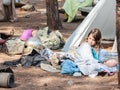 Participant in the reconstruction of Horns of Hattin battle in 1187 sits in the morning near the tent in the camp before the camp Royalty Free Stock Photo