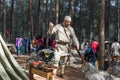 The participant of the reconstruction `Viking Village` shows exercises with a sword in the camp in the forest near Ben Shemen in I Royalty Free Stock Photo