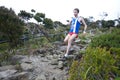 Participant running down Mt Kinabalu Royalty Free Stock Photo