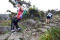 Participant running down Mt Kinabalu Royalty Free Stock Photo