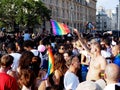 A participant to the 2018 LGBT parade holds a rainbow flag