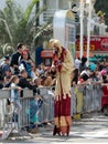 Participants of the annual carnival of Adloyada walking on stilts, dressed in fabulous costumes in Nahariyya, Israel