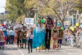 Participants of the annual carnival of Adloyada walking on stilts, dressed in fabulous costumes in Nahariyya, Israel Royalty Free Stock Photo