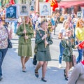 Participants in the column `Immortal Regiment` with portraits of relatives killed in World War II