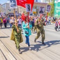 Participants of the column `Immortal Regiment` with portraits of relatives killed in World War II