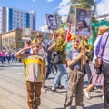 Participants of the column `Immortal Regiment` with portraits of relatives killed in World War II