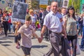 Participants of the column `Immortal Regiment` with portraits of relatives killed in World War II