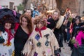 Participants of a costumed parade in the streets of Mala Strana on witch burning night `carodejnice` Royalty Free Stock Photo