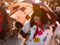 Participants of a costumed parade in the streets of Prague on witch burning night `carodejnice`