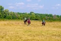 Participants in the equestrian program `Competitions of the medieval riders.` Military-historical festival `Warfare