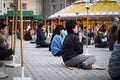 Participants of an openair buddhist ceremony