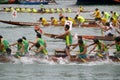 Participants paddle their boats