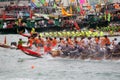 Participants paddle their dragon boats