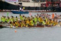 Participants paddle their dragon boats