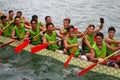 Participants paddle their dragon boats