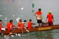 Participants paddle their dragon boats