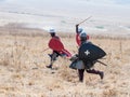 Participants in the reconstruction of Horns of Hattin battle in 1187 Dressed in the costumes of the crusaders are running into the