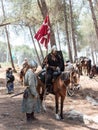 Participants in the reconstruction of Horns of Hattin battle in 1187 one sits on a battle horse, and the second stands near him in