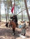 Participants in the reconstruction of Horns of Hattin battle in 1187 one sits on a battle horse, and the second stands near him in