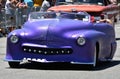 Participants riding car during the 34th Annual Mermaid Parade at Coney Island