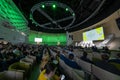 Participants of science conference in spacious hall Royalty Free Stock Photo