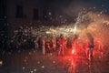 Participants of spectacle Correfocs (fire runs) dancing with fir Royalty Free Stock Photo