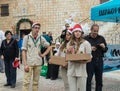 Participants of the support group award commemorative medals to the participants at the finish of the annual race `Cristmas Run` i