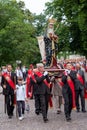 Participants taking part in a procession for the Catholic Church`s Feast of Corpus Christi, in Krakow Old Town, Poland