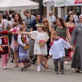 Participants taking part in a procession for the Catholic Church`s Feast of Corpus Christi, in Krakow old town, Poland