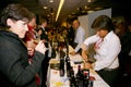 Participants and visitors to the business exhibition of manufacturers and suppliers of italian wines and food vinitaly Royalty Free Stock Photo