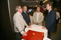 Participants and visitors to the business exhibition of manufacturers and suppliers of italian wines and food vinitaly Royalty Free Stock Photo