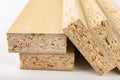 Particleboard with veneer is cut into small pieces. Materials for carpenters to build furniture