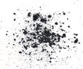 Particles of charcoal on white background