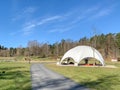 PARTILLE, SWEDEN - Apr 20, 2020: A new white chapel, a cemetery, like a dome, has been built outdoors for funerals