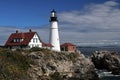 Parting storm clouds over Portland Head Lighthouse Royalty Free Stock Photo