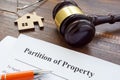 Partition of property agreement, gavel and house model. Royalty Free Stock Photo