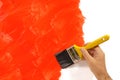 Unfinished partly painted red wall, man holding paintbrush, copy space Royalty Free Stock Photo