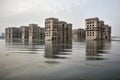 partly submerged city, with only the tops of buildings visible above water