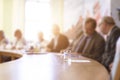 Partner meetings at a long table. The photography is blurry Royalty Free Stock Photo