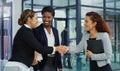 Partners, handshake and agree on plan for welcome, deal and thank you for merger at finance firm. Business people Royalty Free Stock Photo