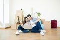 Partners Shopping Online For New Home While Sitting On Floor Royalty Free Stock Photo