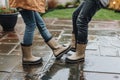 partners in waterproof boots do a jitterbug on a wet patio