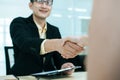 Partnership. business people partner shaking hand after business signing contract desk in meeting room at company office, job inte