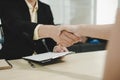 Partnership. business people partner shaking hand after business signing contract desk in meeting room at company office, job inte Royalty Free Stock Photo