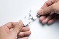 Partnership concept with hands putting puzzle pieces together Royalty Free Stock Photo