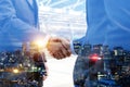 Partnership. double exposure image of investor business man handshake with partner for successful meeting Royalty Free Stock Photo