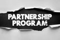 Partnership Program text on torn paper background. Business collaboration and teamwork concept message in bold grunge typography Royalty Free Stock Photo