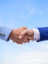 Partnership and support. Successful deal handshake blue sky background. Shaking hands at meeting. Friendly handshake