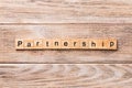 Partnership word written on wood block. partnership text on wooden table for your desing, concept Royalty Free Stock Photo